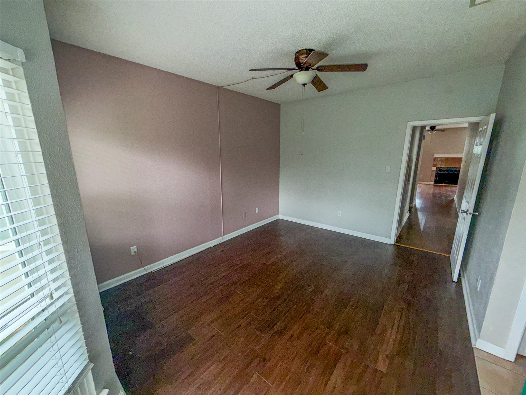 5313 Indio Drive, Unit D Austin, TX 78745 - Photo 12 of 17 a view of empty room with wooden floor