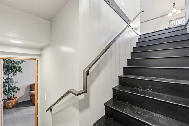 a living room with furniture and a gate