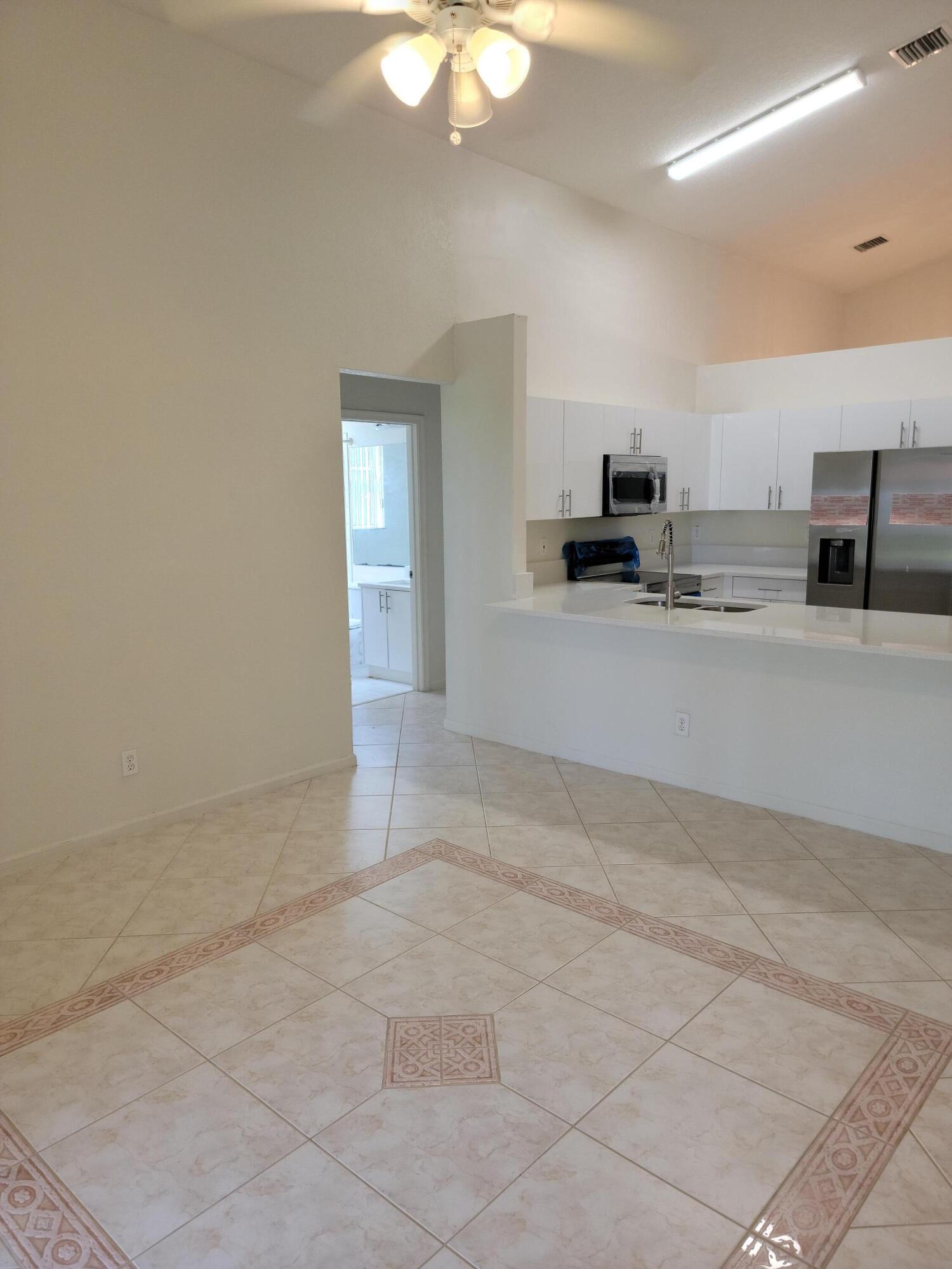 6767 Silver Ridge Lane Greenacres, FL 33413 - Photo 5 of 18 20230926_112427
