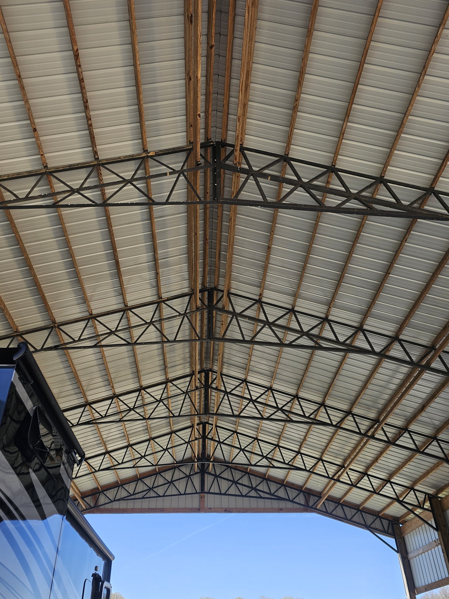 1803 Hardin Bottom River Road Clifton, TN 38425 - Photo 11 of 60 a bathroom with a sink and a shower curtain