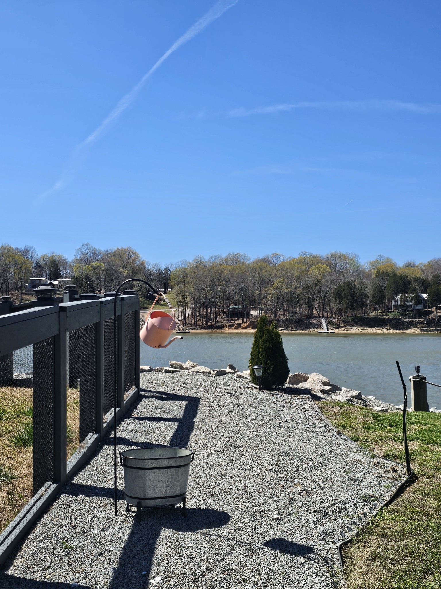 1803 Hardin Bottom River Road Clifton, TN 38425 - Photo 33 of 60 a view of a lake with a terrace
