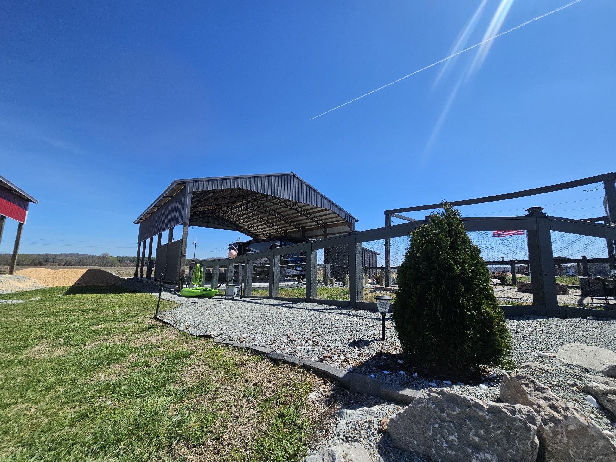 1803 Hardin Bottom River Road Clifton, TN 38425 - Photo 41 of 60 a view of a house with a yard