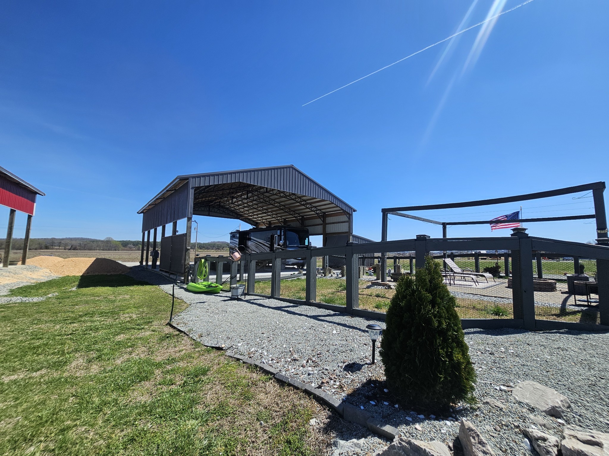 1803 Hardin Bottom River Road Clifton, TN 38425 - Photo 42 of 60 a view of a house with a yard