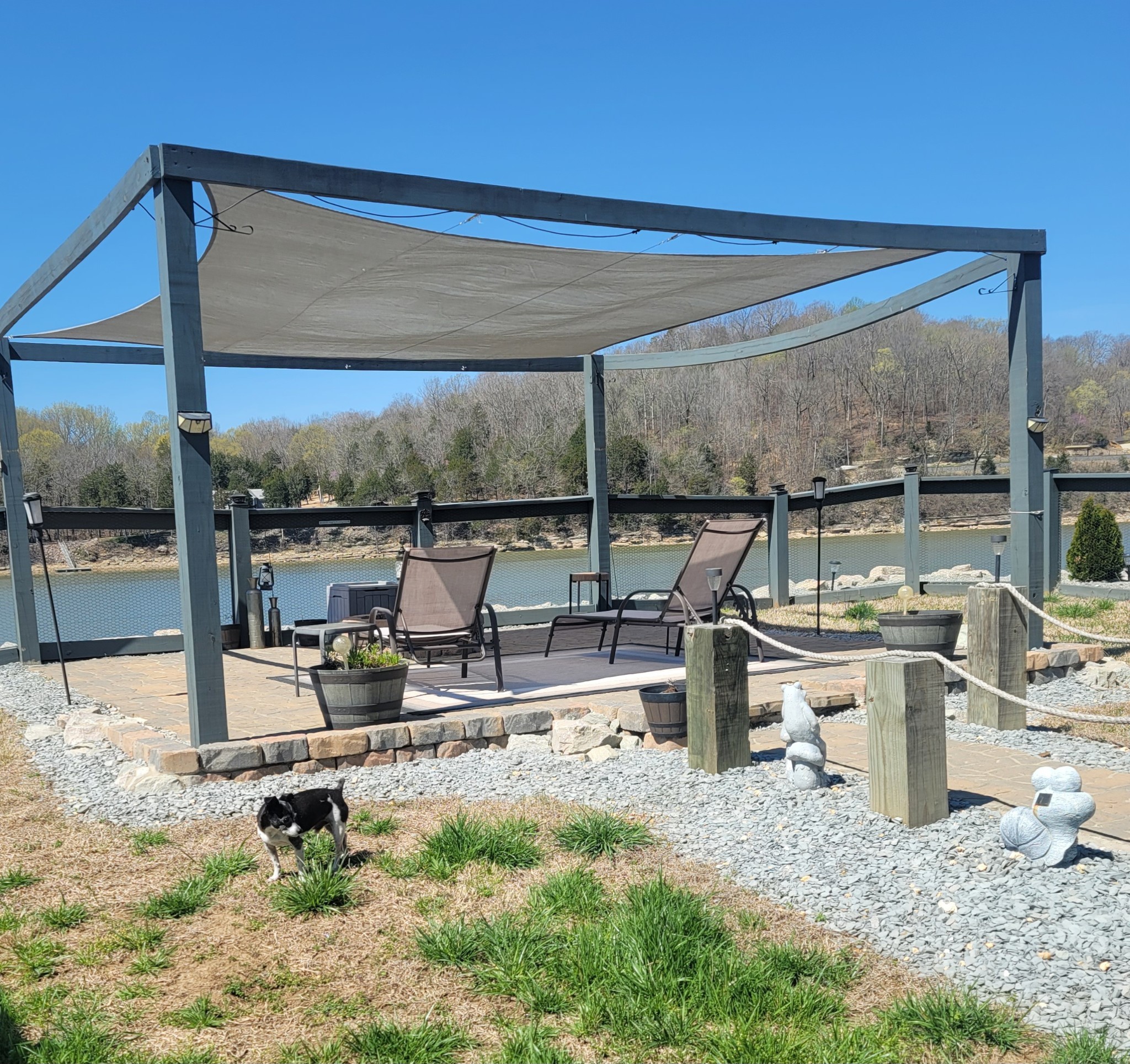 1803 Hardin Bottom River Road Clifton, TN 38425 - Photo 52 of 60 a view of a swimming pool with chairs in front of house