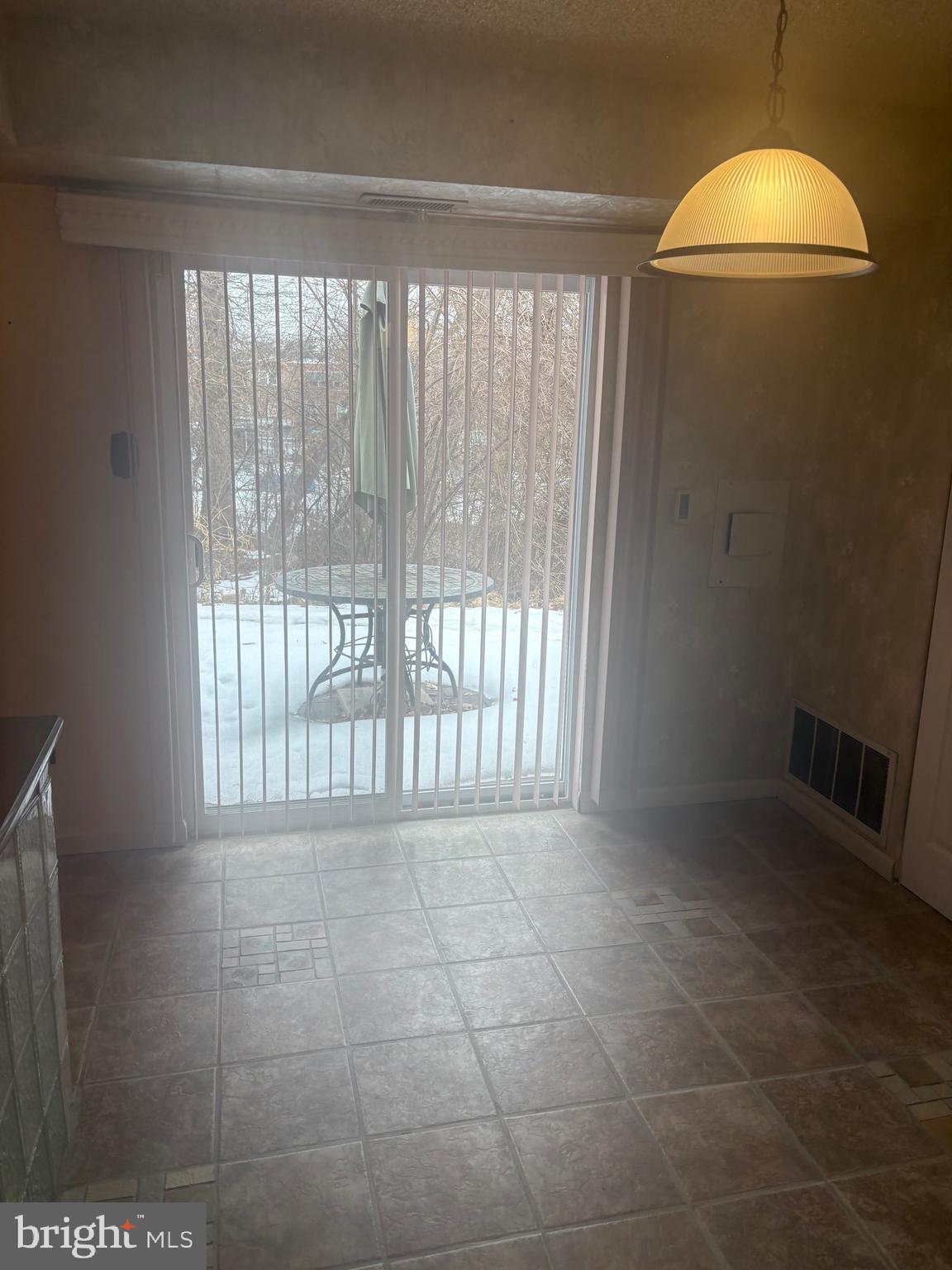 11829 Academy Road, Unit 29B Philadelphia, PA 19154 - Photo 14 of 33 a view of an empty room with a window