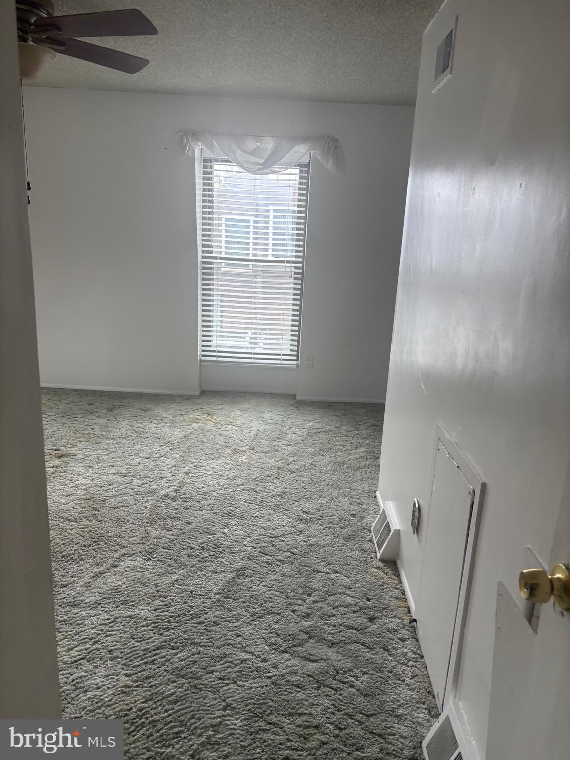 11829 Academy Road, Unit 29B Philadelphia, PA 19154 - Photo 17 of 33 a view of an empty room with windows