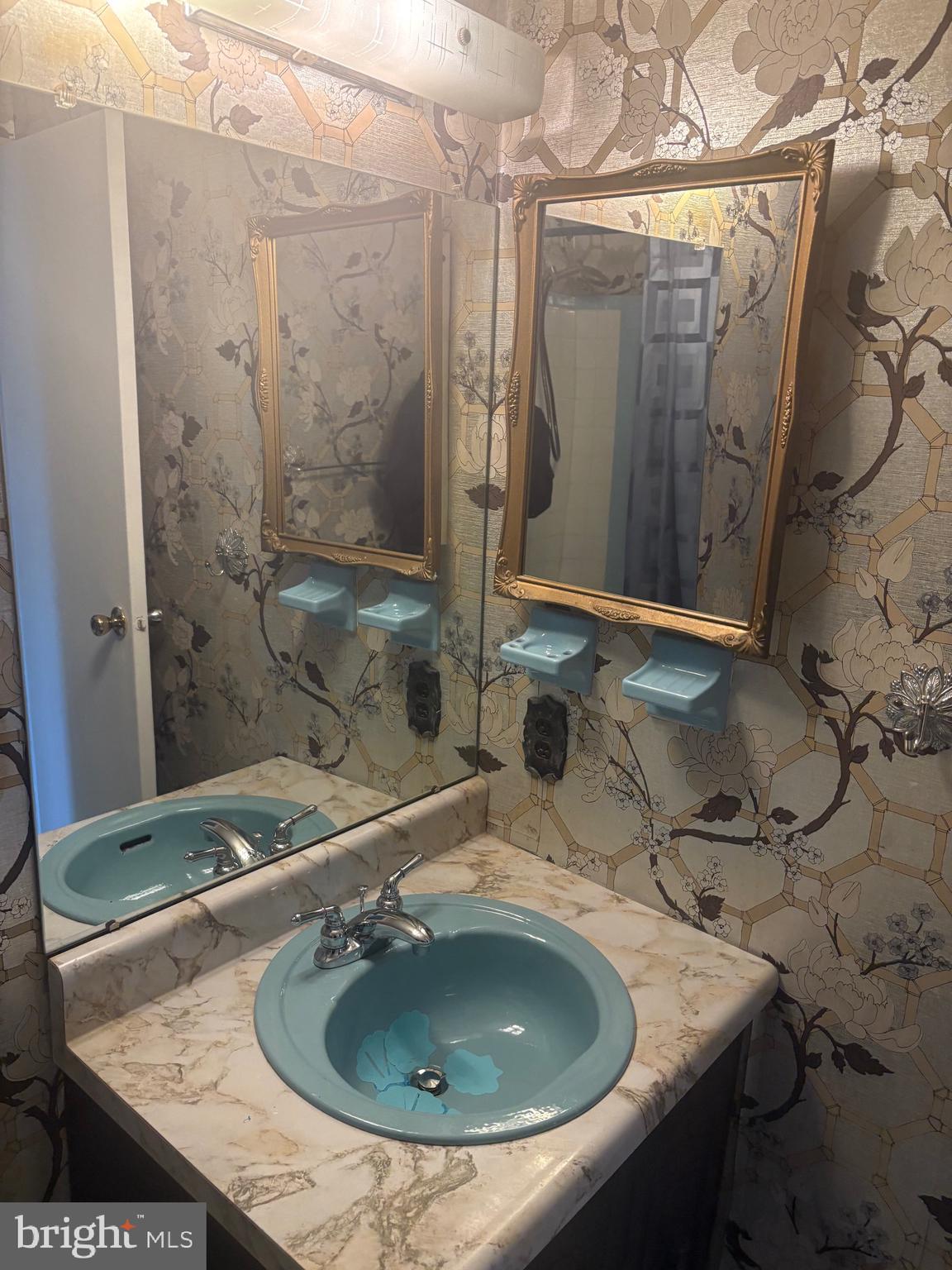 11829 Academy Road, Unit 29B Philadelphia, PA 19154 - Photo 19 of 33 a bathroom with a sink and shower