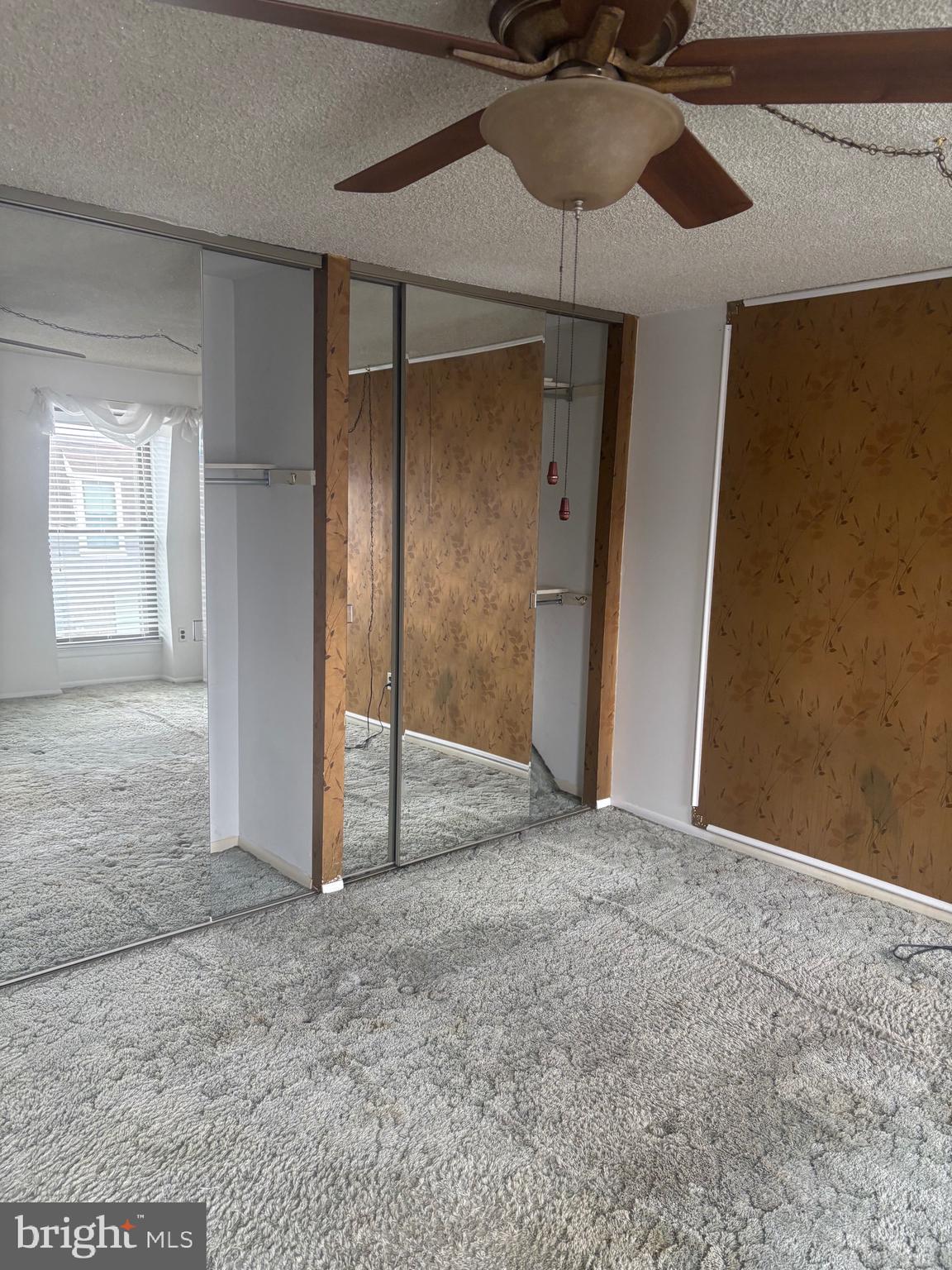 11829 Academy Road, Unit 29B Philadelphia, PA 19154 - Photo 20 of 33 an empty room with fan and entryway