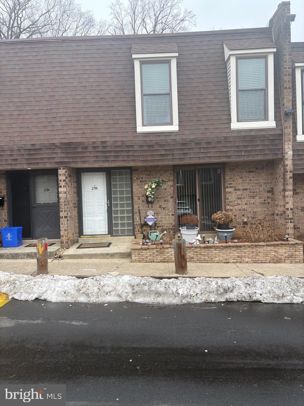 11829 Academy Road, Unit 29B Philadelphia, PA 19154 - Photo 2 of 33 a view of a house with a window and a fireplace