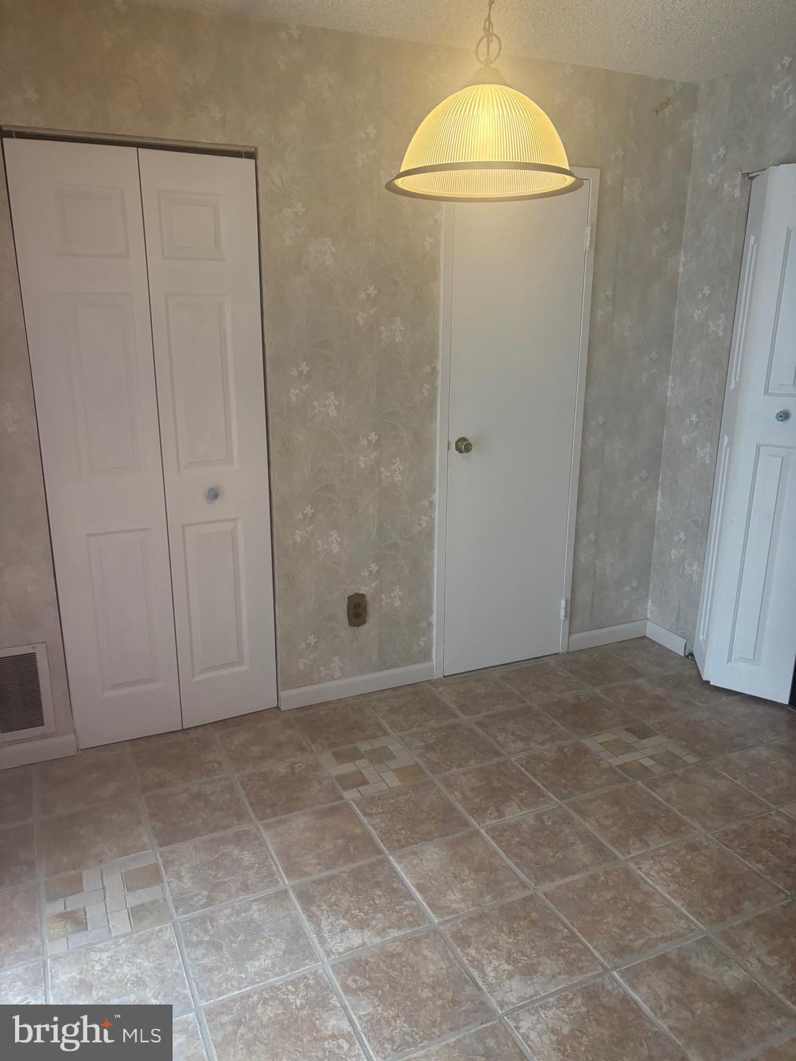 11829 Academy Road, Unit 29B Philadelphia, PA 19154 - Photo 30 of 33 a view of a room with an empty space