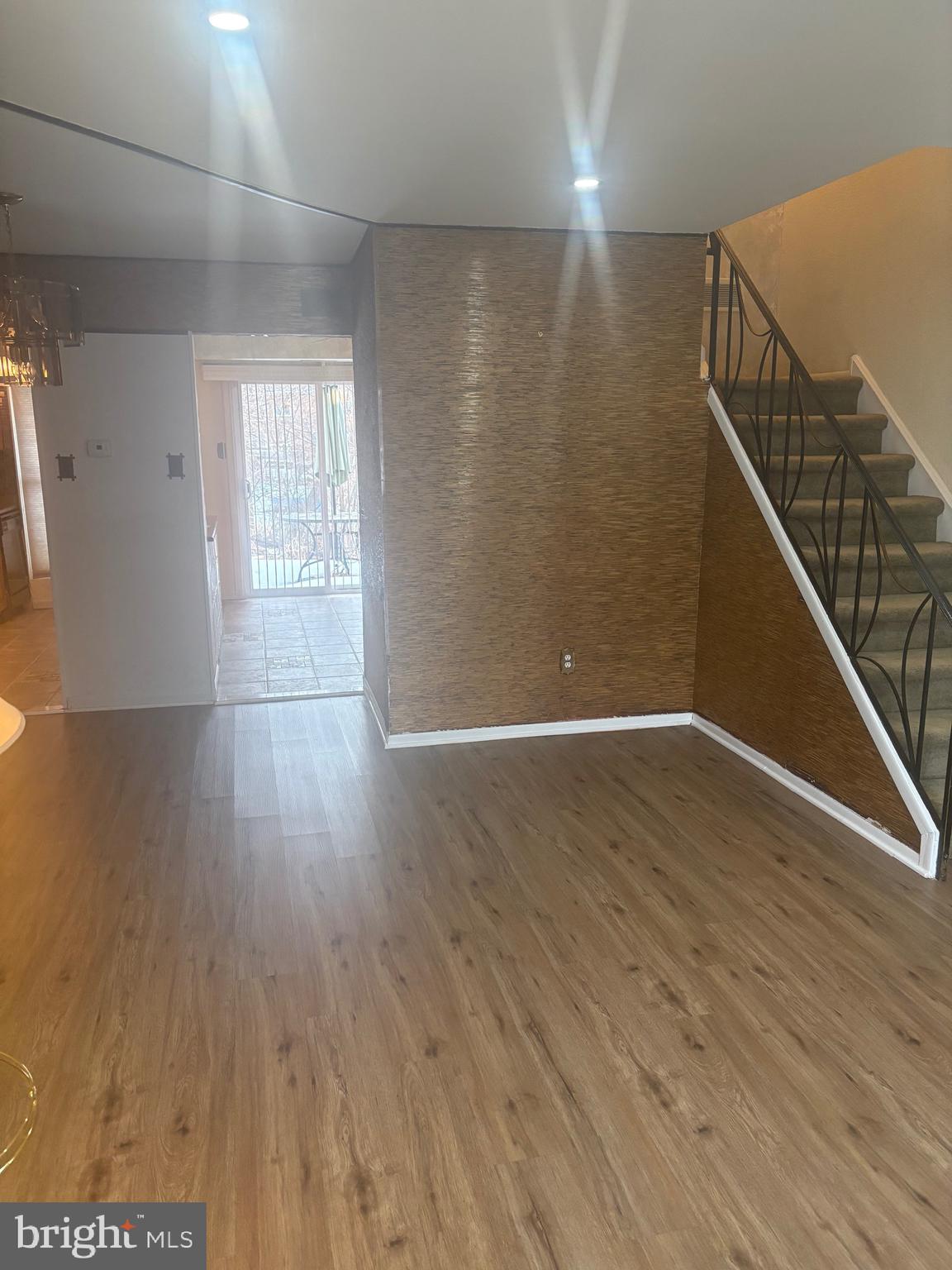 11829 Academy Road, Unit 29B Philadelphia, PA 19154 - Photo 3 of 33 a view of a hallway with wooden floor