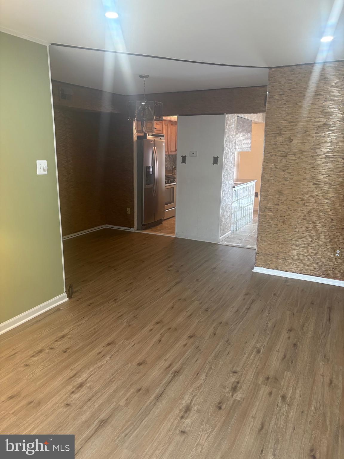 11829 Academy Road, Unit 29B Philadelphia, PA 19154 - Photo 4 of 33 a view of empty room with wooden floor