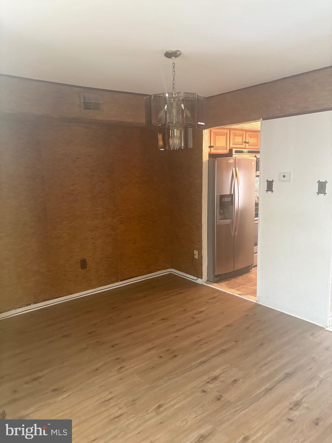 11829 Academy Road, Unit 29B Philadelphia, PA 19154 - Photo 5 of 33 a view of a kitchen with wooden floor