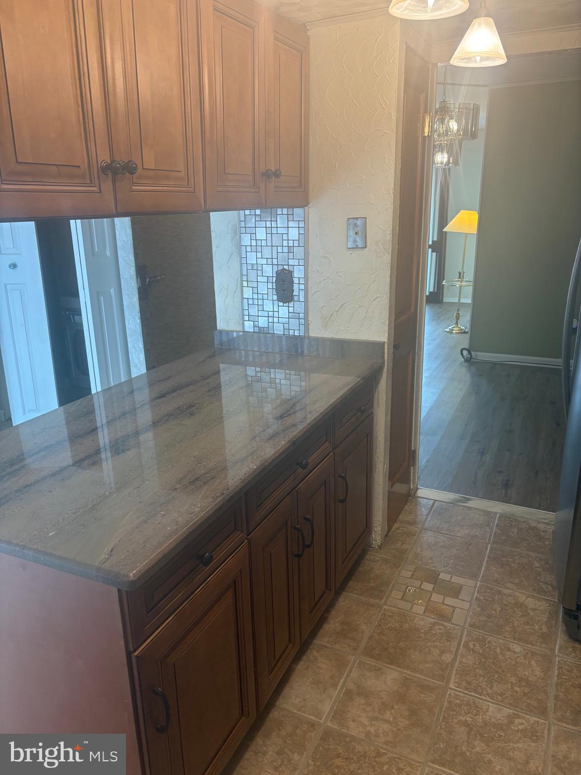 11829 Academy Road, Unit 29B Philadelphia, PA 19154 - Photo 8 of 33 a view of a kitchen cabinets and a counter place
