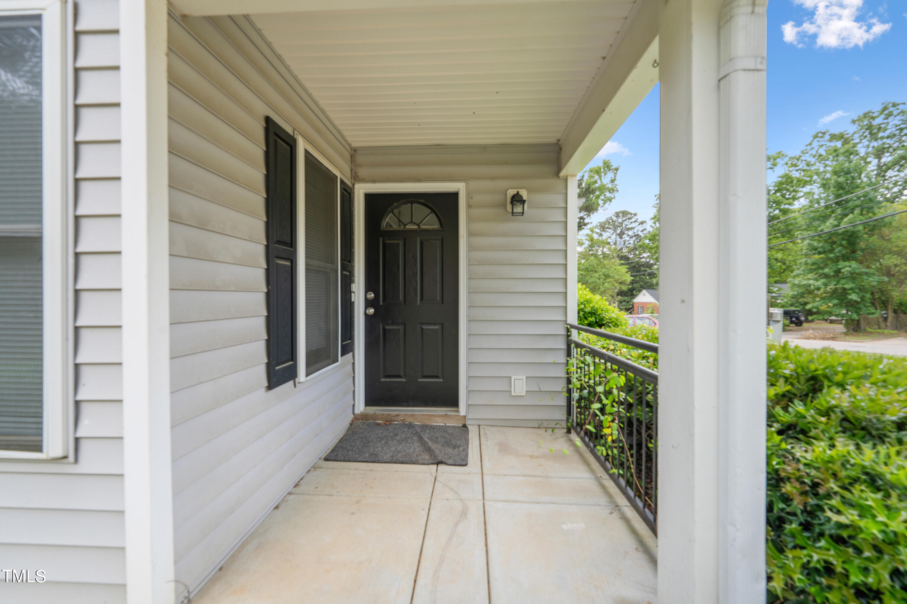 1005 Chaney Road Raleigh, NC 27606 - Photo 11 of 18 a view of house with potted plants