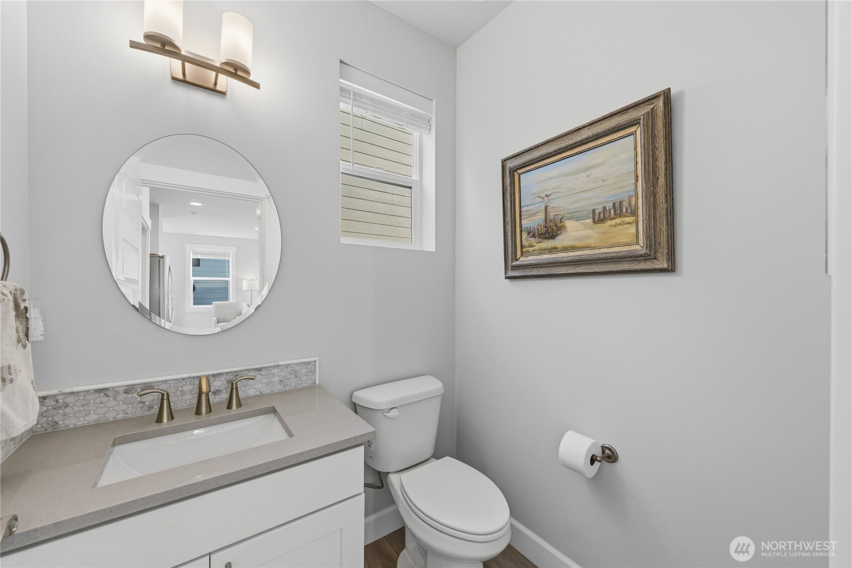 405 Maple Avenue La Conner, WA 98257 - Photo 11 of 40 a bathroom with a toilet a sink and mirror