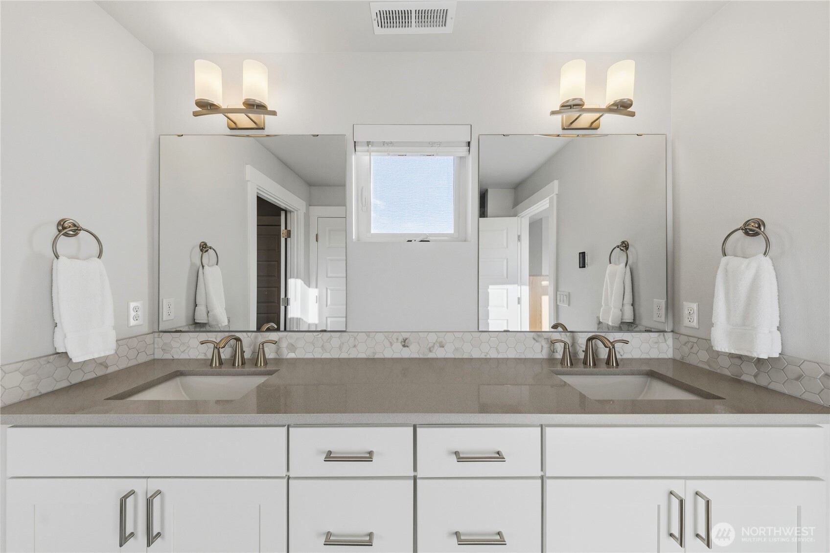 405 Maple Avenue La Conner, WA 98257 - Photo 14 of 40 a bathroom with double vanity sinks a vanity and a mirror