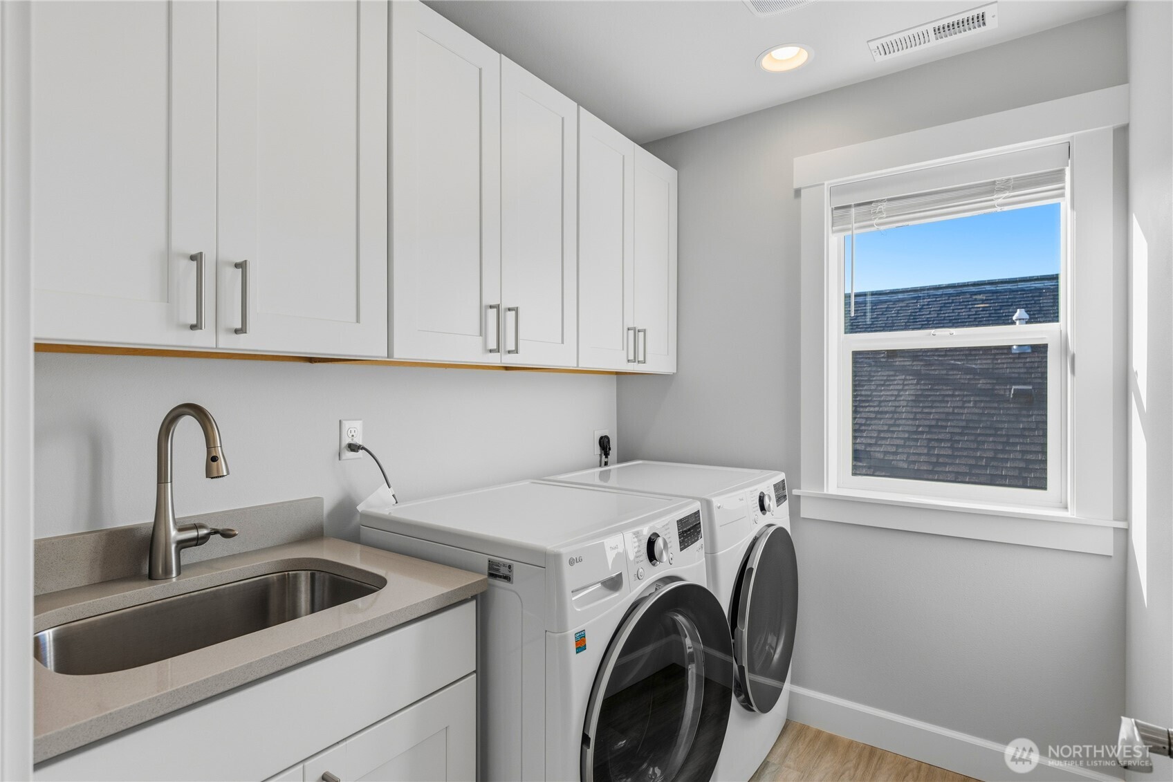405 Maple Avenue La Conner, WA 98257 - Photo 19 of 40 a view of storage and utility room with washer and dryer