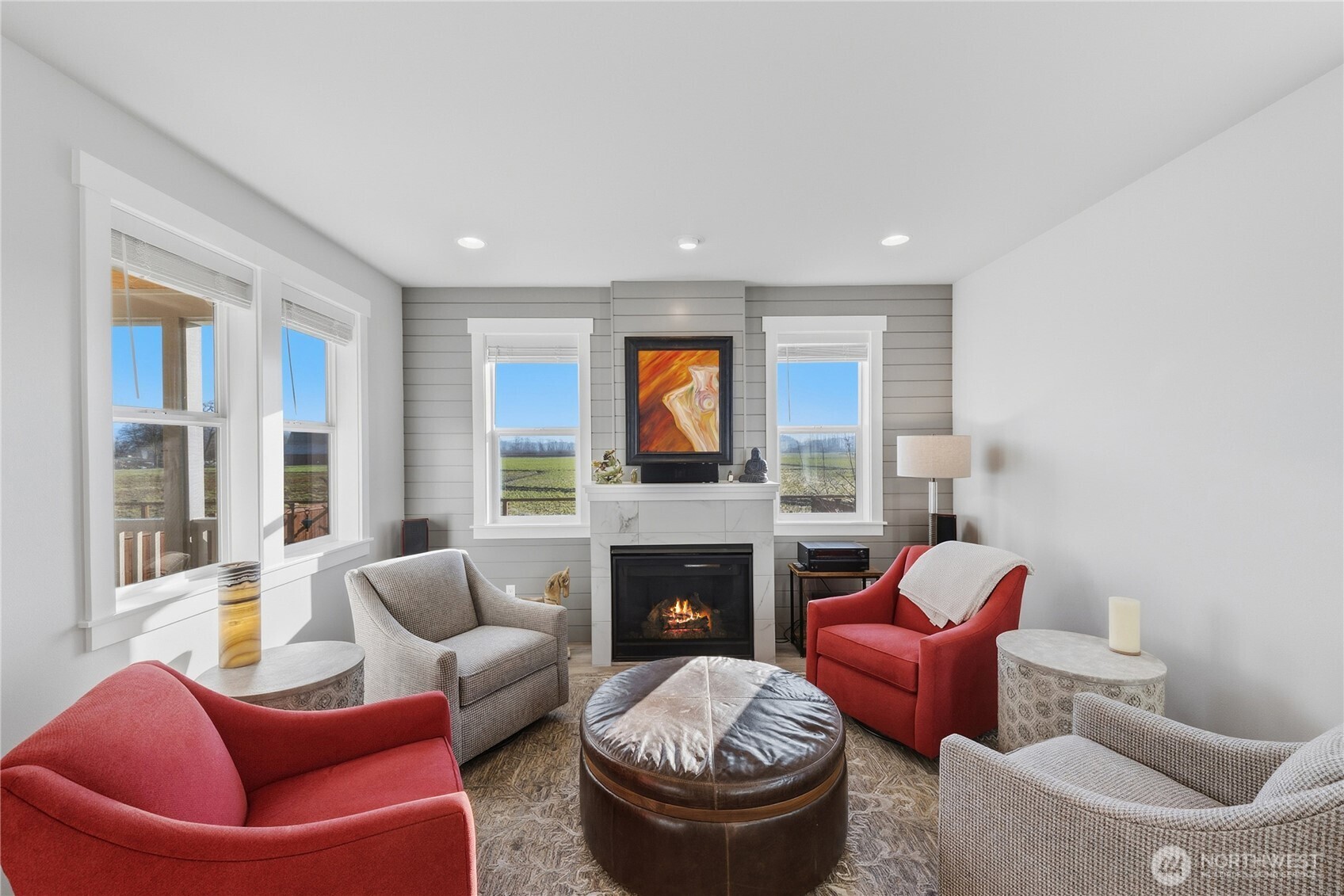 405 Maple Avenue La Conner, WA 98257 - Photo 3 of 40 a living room with furniture a flat screen tv and a fireplace