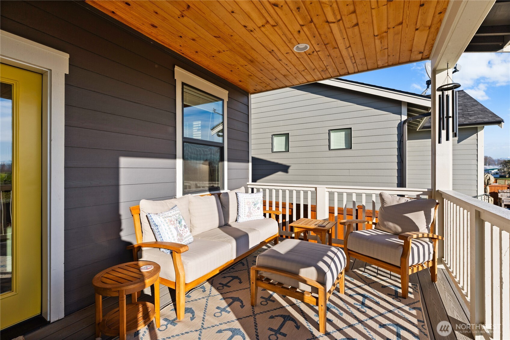 405 Maple Avenue La Conner, WA 98257 - Photo 32 of 40 a view of a patio with a table and chairs
