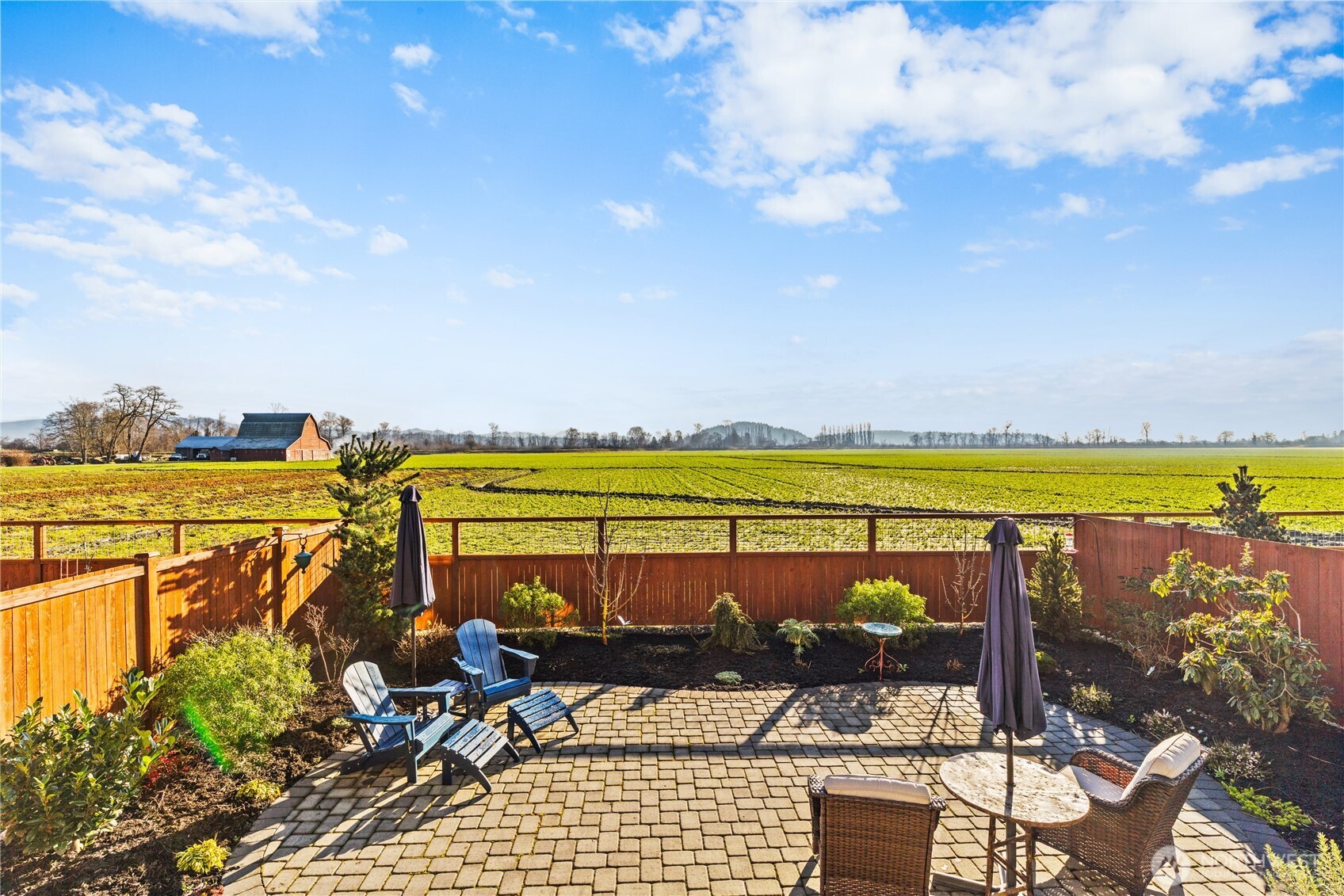 405 Maple Avenue La Conner, WA 98257 - Photo 33 of 40 a view of a swimming pool with a lounge chair