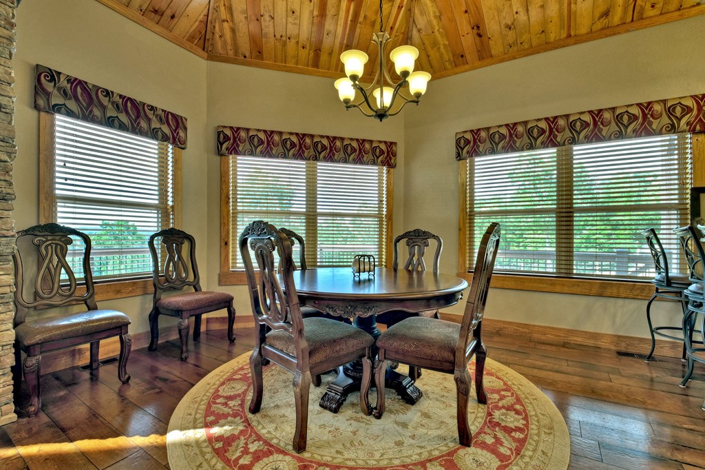 45 Flat Top Trail Murphy, NC 28906 - Photo 14 of 53 a view of a dining room with furniture window and wooden floor