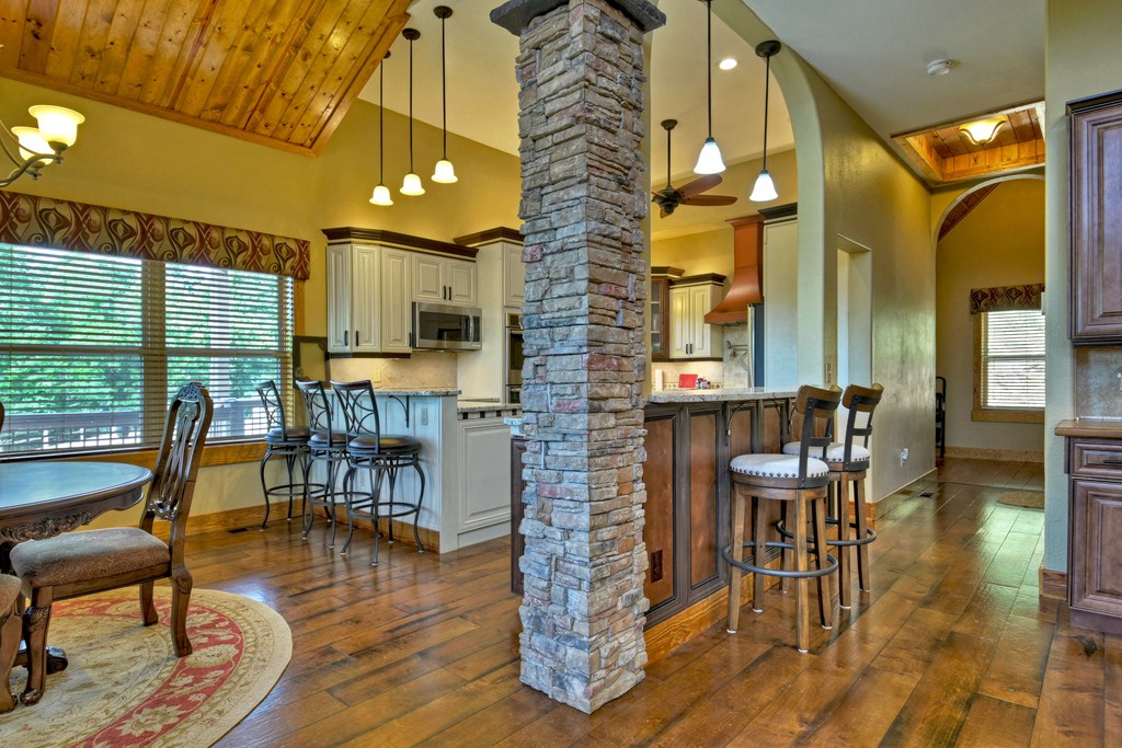 45 Flat Top Trail Murphy, NC 28906 - Photo 15 of 53 a view of a dining room with furniture window and wooden floor