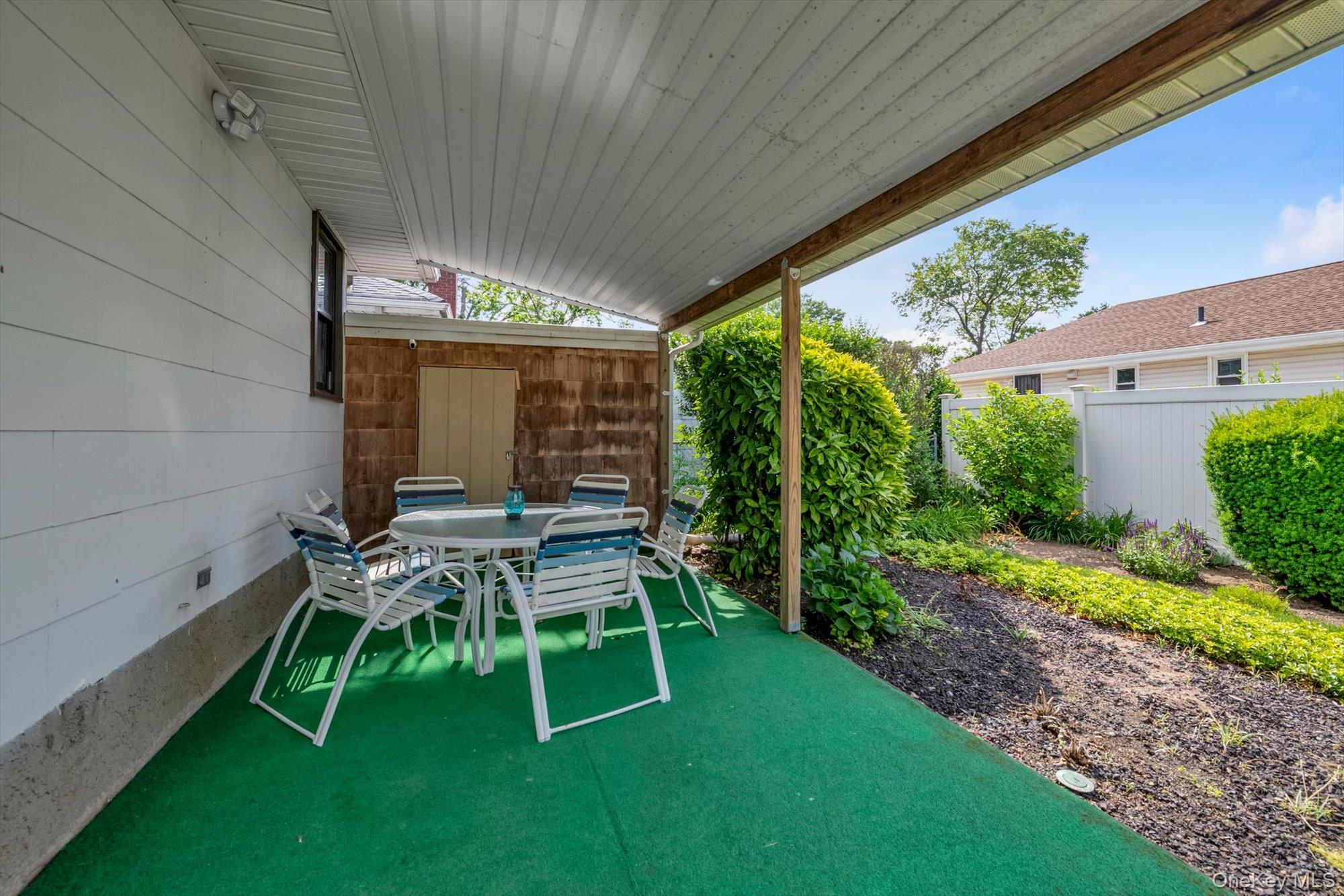 57 Lawrence Road Hempstead, NY 11550 - Photo 14 of 19 Patio terrace