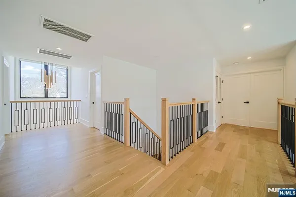 a bedroom with a large bed and a couch