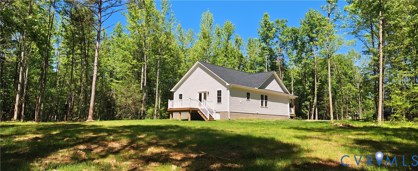 320 Vogel Road Cumberland, VA 23040 - Photo 23 of 27 a front view of a house with a yard and trees