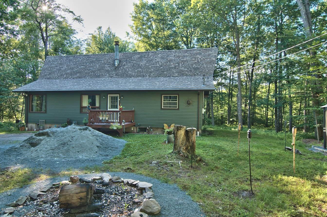 365 Welcome Lake Road Beach Lake, PA 18405 - Photo 41 of 45 a front view of a house with a garden