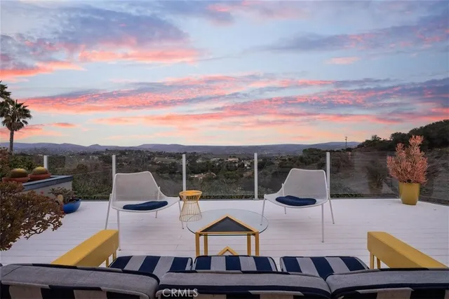 swimming pool view with a lounge chair