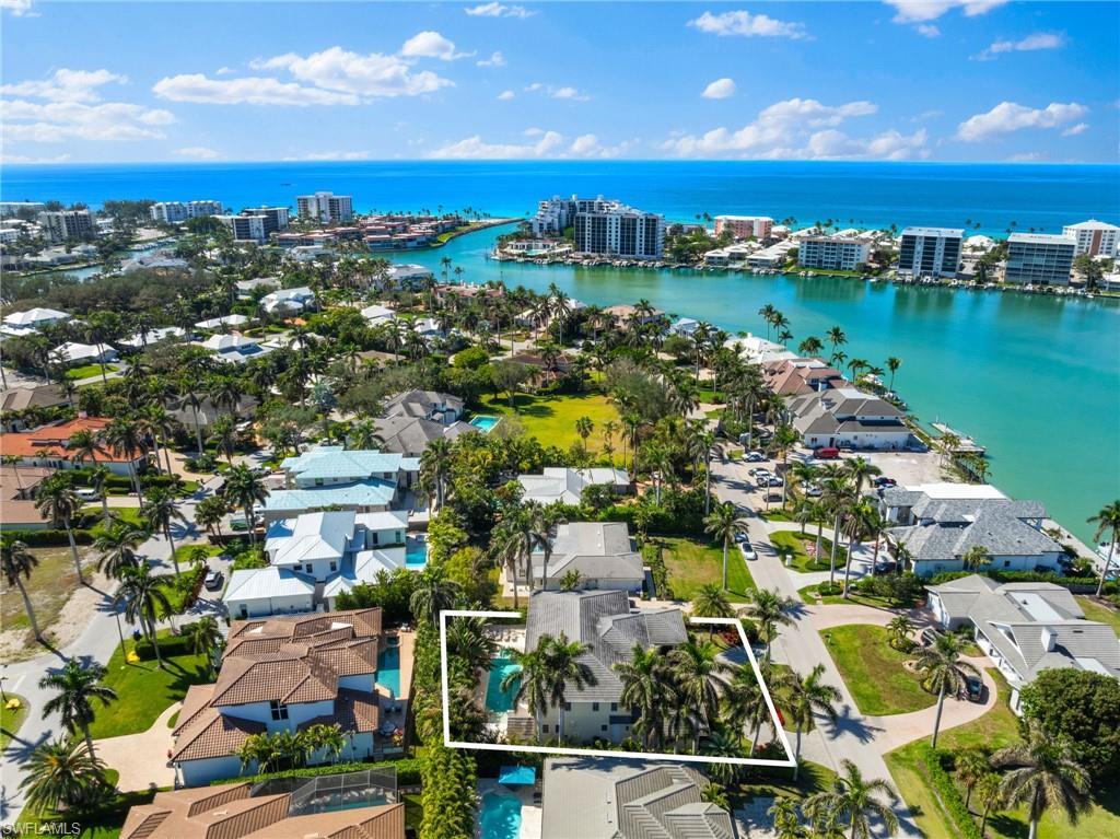 390 Windward Way Naples, FL 34103 - Photo 2 of 42 a view of a city