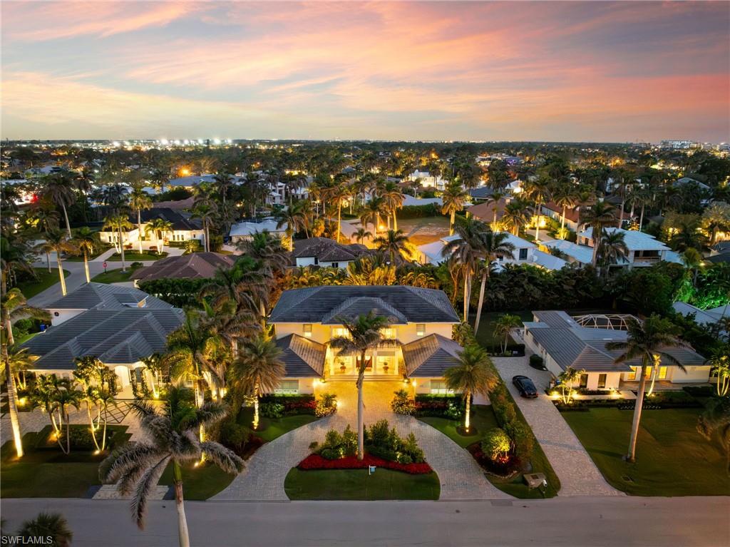 390 Windward Way Naples, FL 34103 - Photo 42 of 42 an aerial view of a city with lots of residential buildings