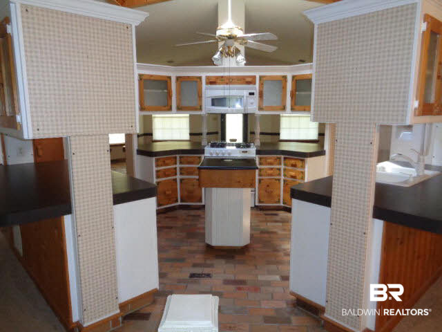 28202 Vargo Lane Elberta, AL 36530 - Photo 6 of 45 View from front door. 21 x 15. Brick floor. Custom cabinets