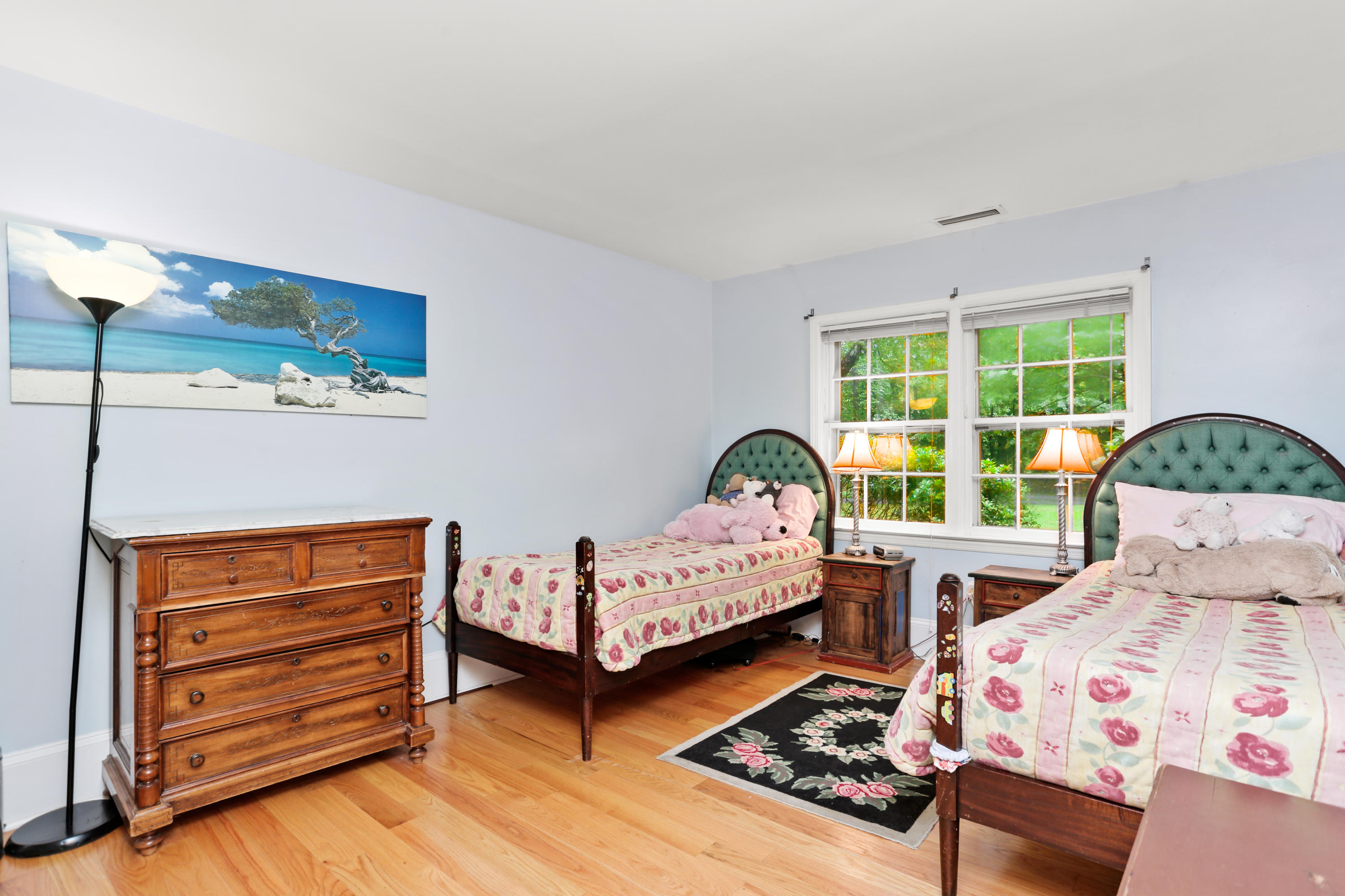 5 Stony Brook Road South Darien, CT 06820 - Photo 16 of 27 a bedroom with two beds and large window