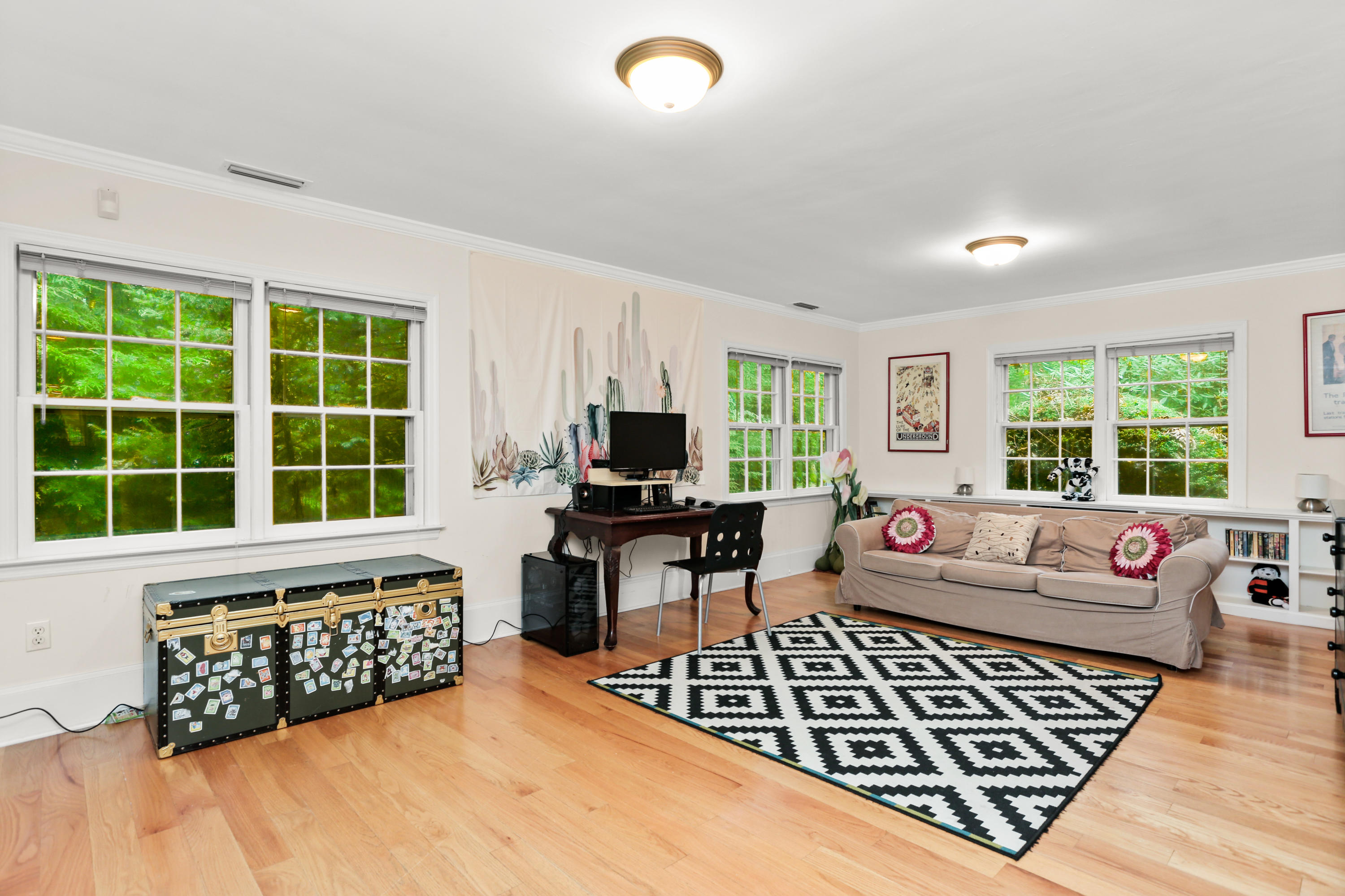5 Stony Brook Road South Darien, CT 06820 - Photo 17 of 27 a living room with furniture window and flat screen tv