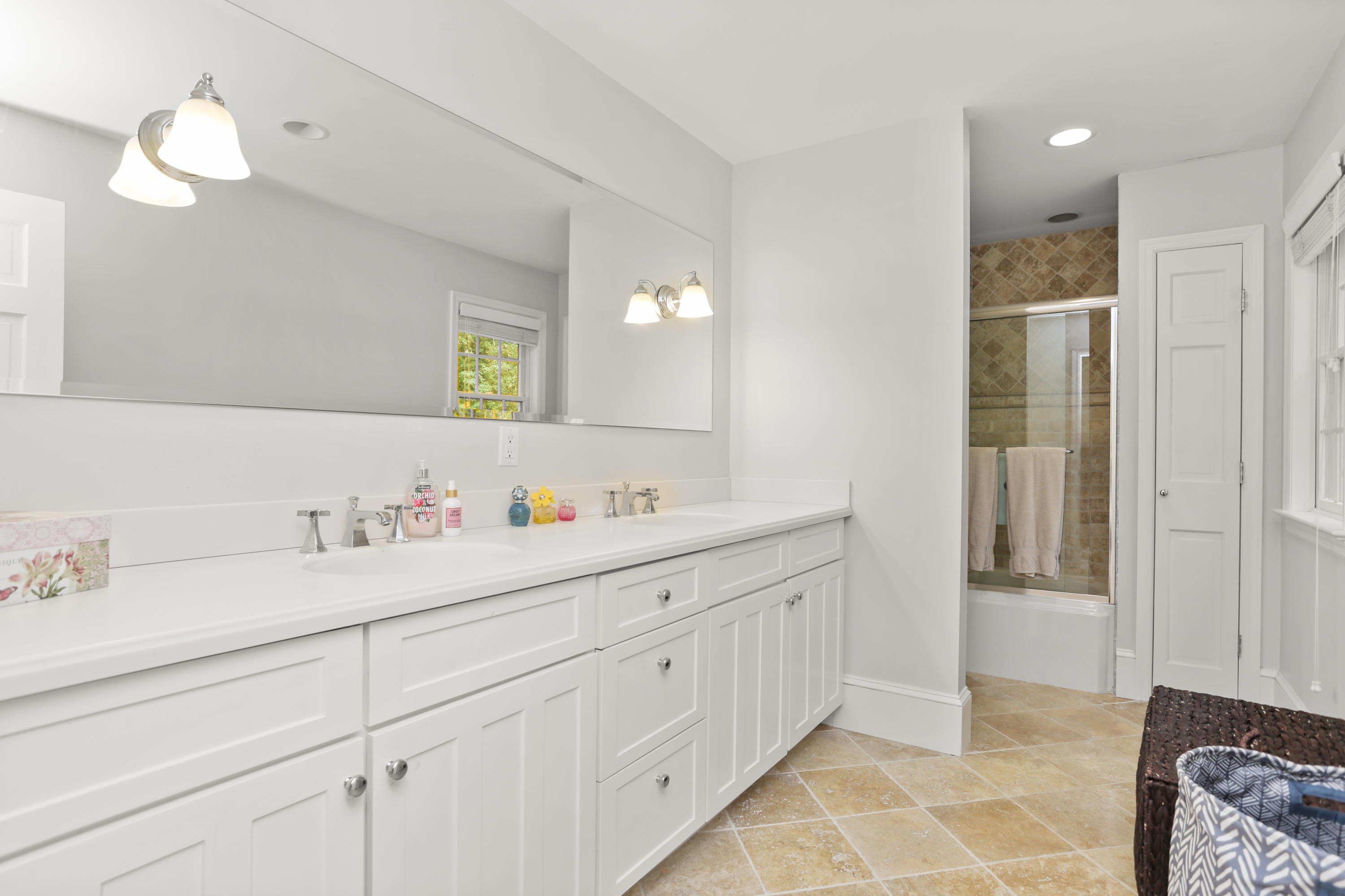 5 Stony Brook Road South Darien, CT 06820 - Photo 19 of 27 a bathroom with a sink and a mirror