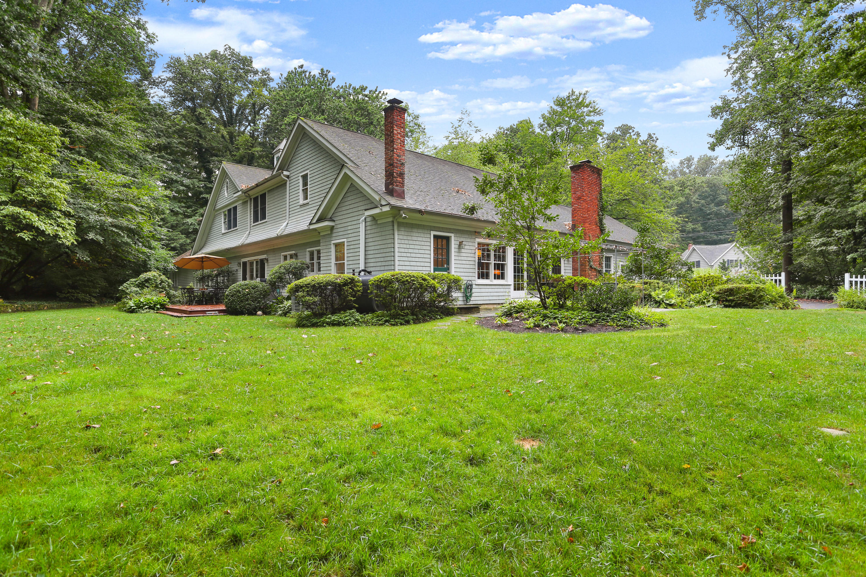 5 Stony Brook Road South Darien, CT 06820 - Photo 23 of 27 a front view of house with garden