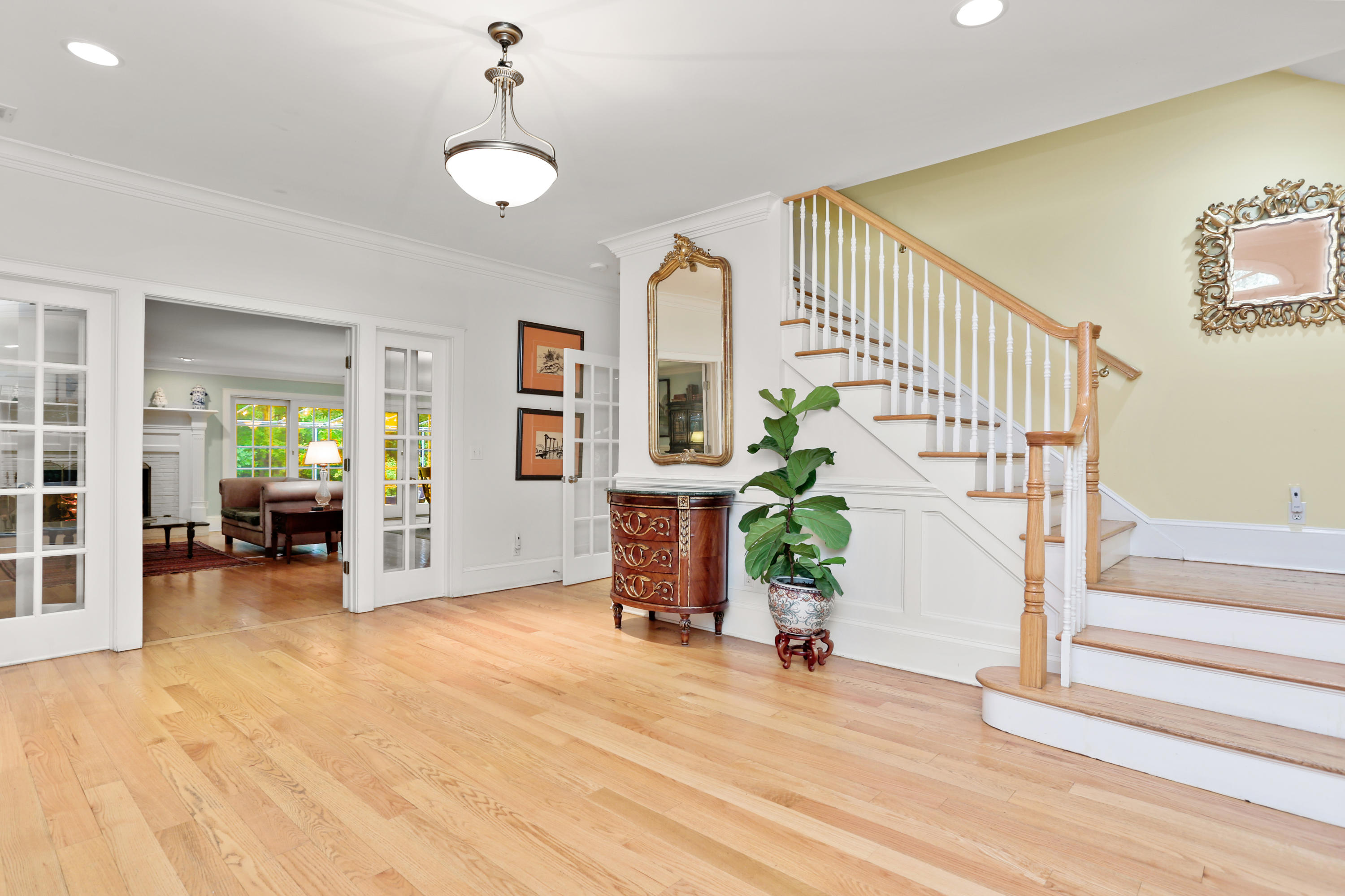 5 Stony Brook Road South Darien, CT 06820 - Photo 6 of 27 a view of livingroom with furniture and staircase