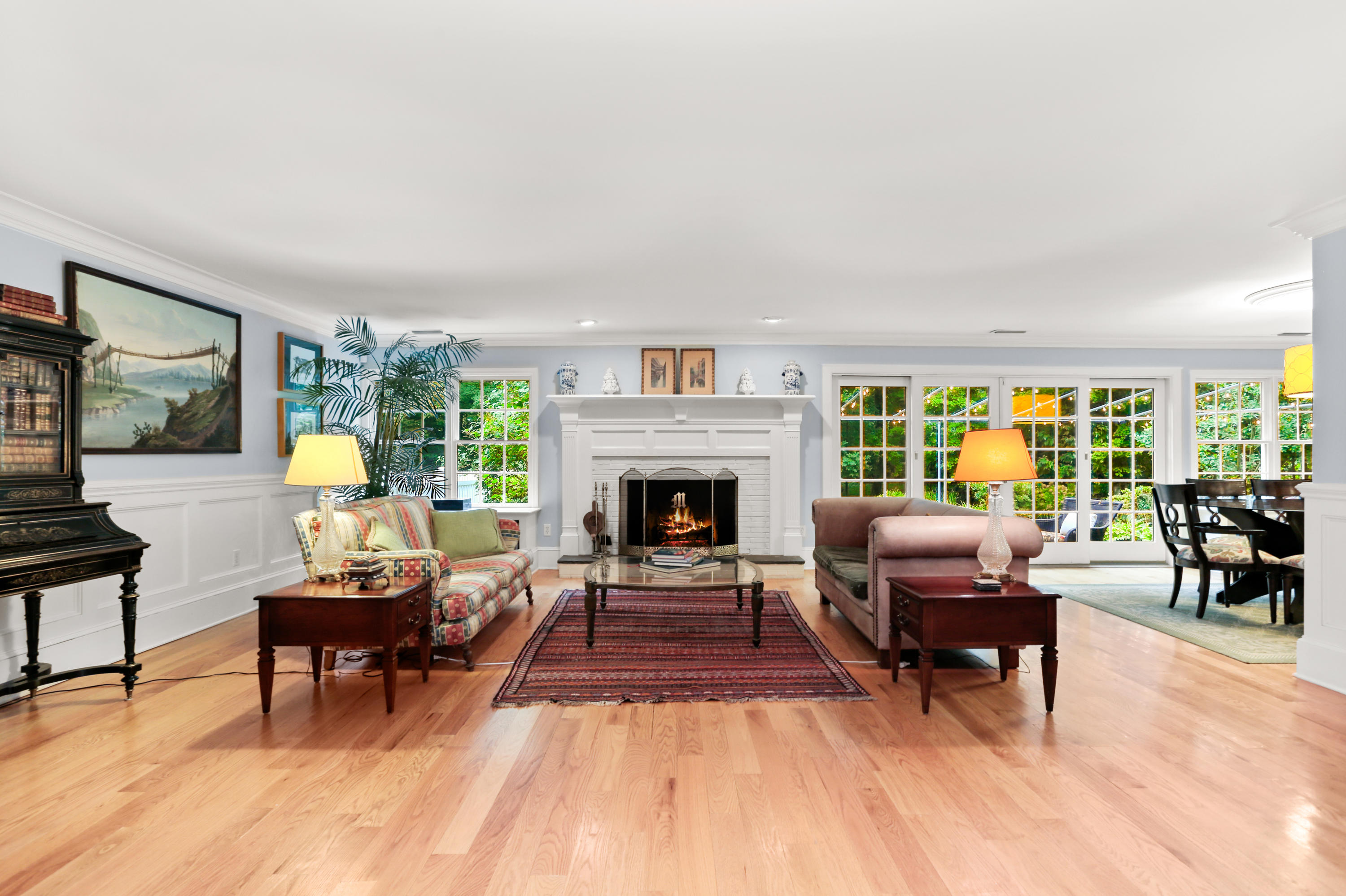 5 Stony Brook Road South Darien, CT 06820 - Photo 7 of 27 a living room with furniture and a fireplace