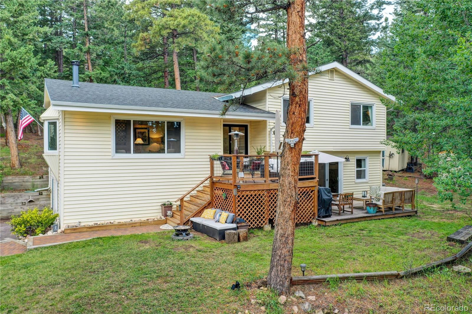 6549 Modoc Lane Evergreen, CO 80439 - Photo 39 of 39 a view of a house with backyard