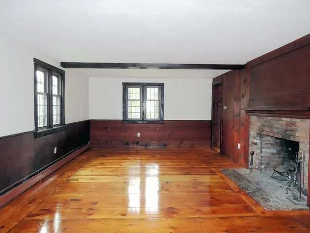 a living room with a fireplace