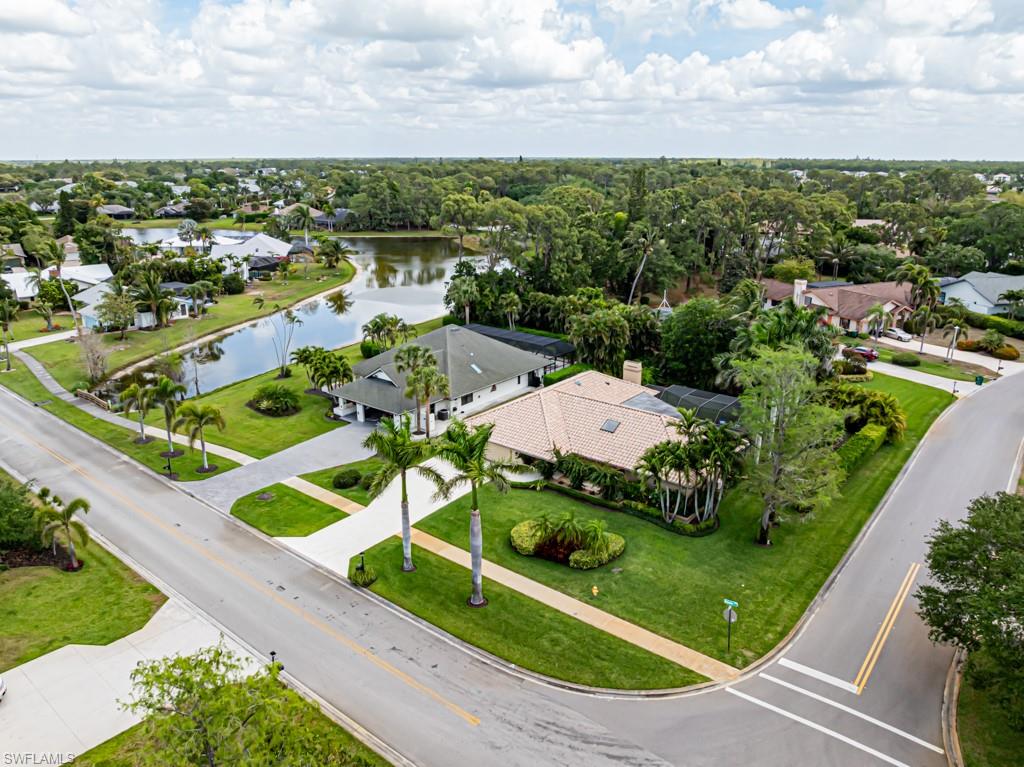 2308 Kings Lake Boulevard Naples, FL 34112 - Photo 2 of 36 an aerial view of residential houses with outdoor space