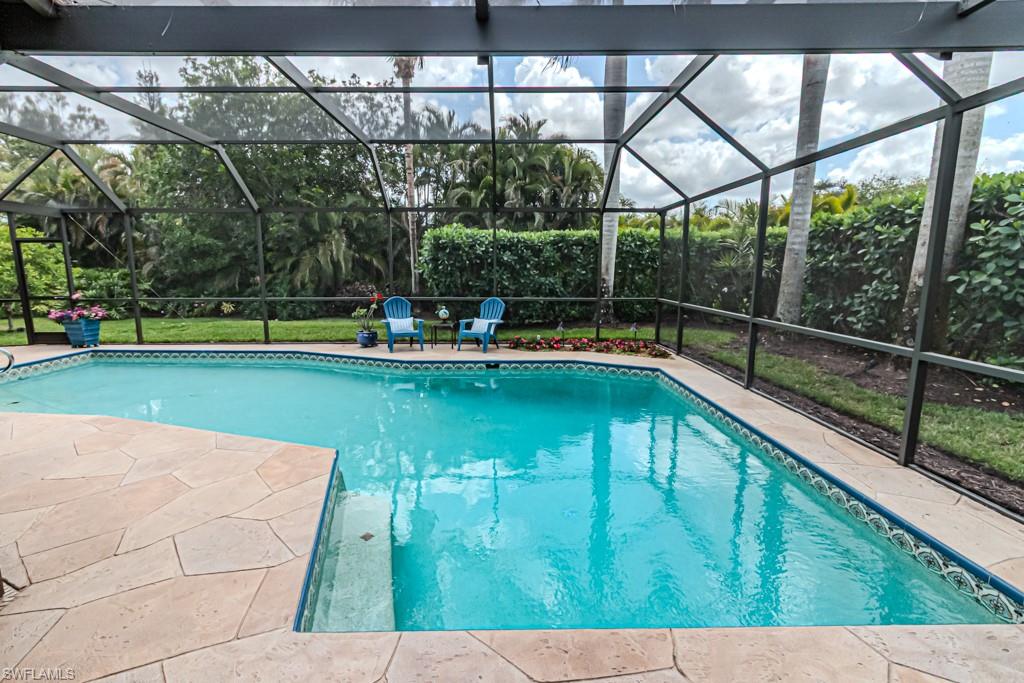 2308 Kings Lake Boulevard Naples, FL 34112 - Photo 33 of 36 a view of swimming pool with a patio