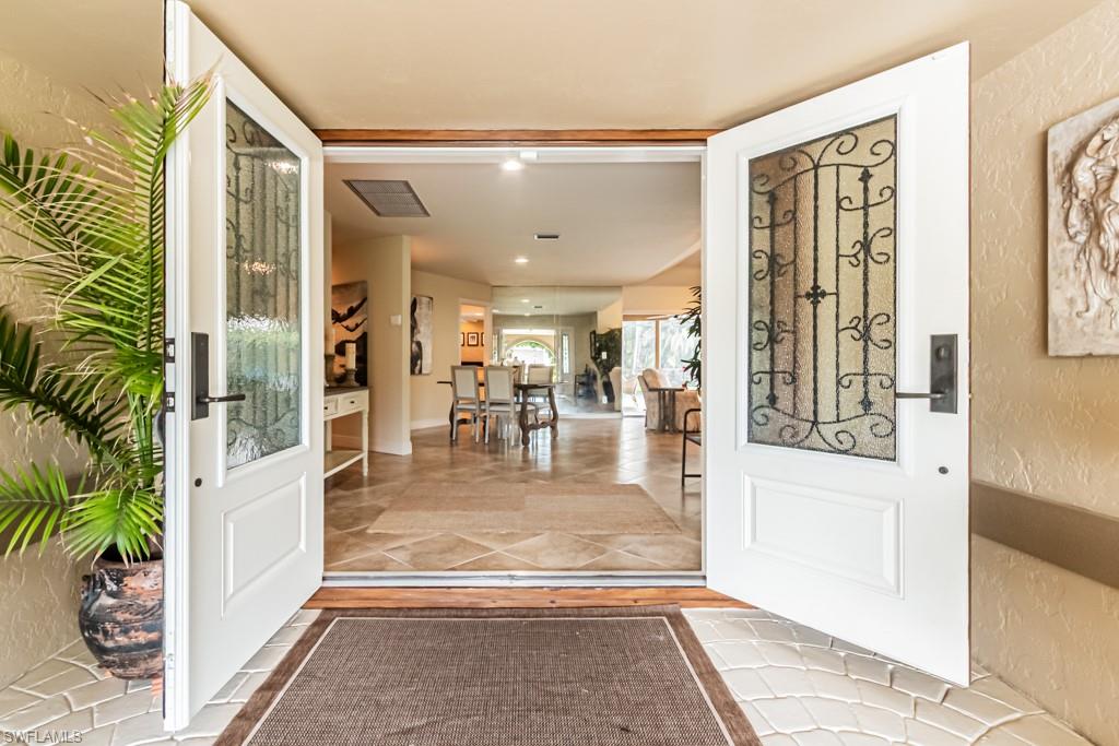 2308 Kings Lake Boulevard Naples, FL 34112 - Photo 7 of 36 a view of a living room