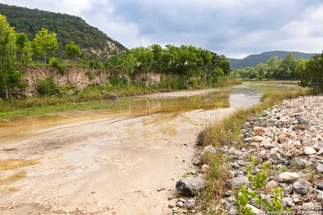 a view of lake with mountain