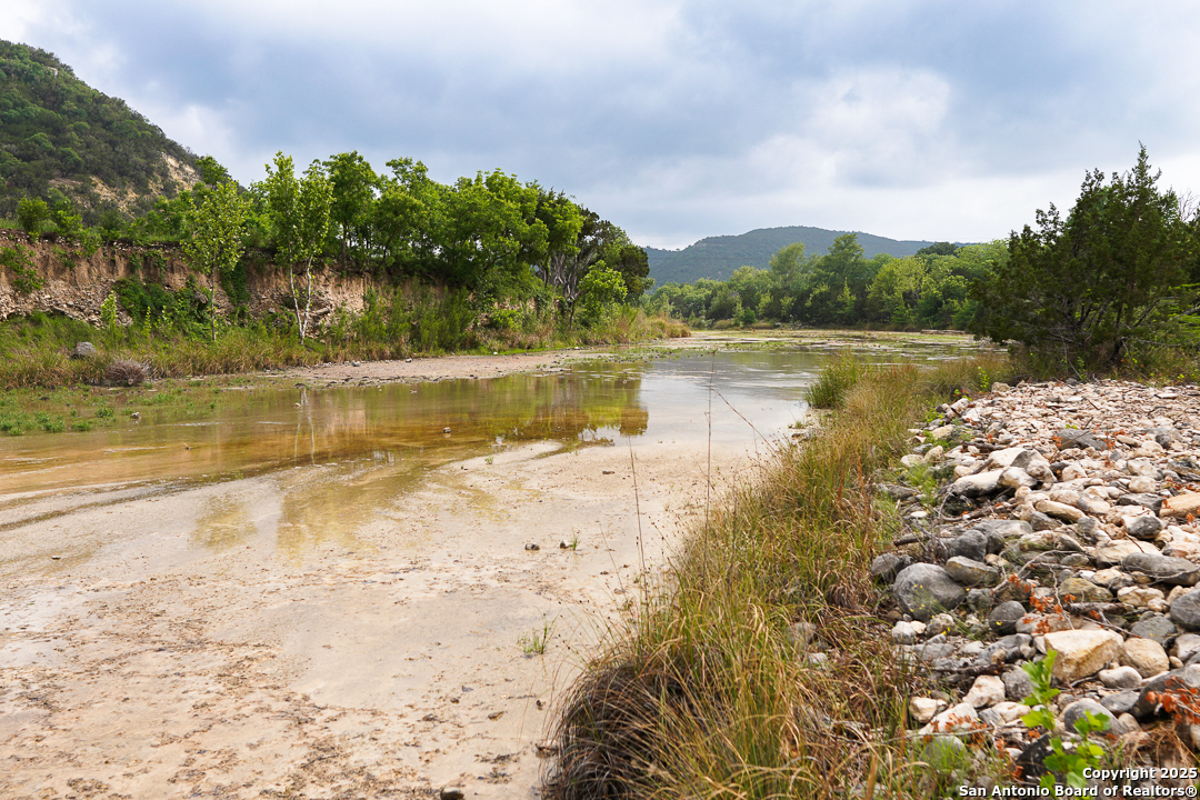 35298 Ranch To Market Road 187 Vanderpool, TX 78885 - Photo 14 of 29 a view of lake view and mountain in the back