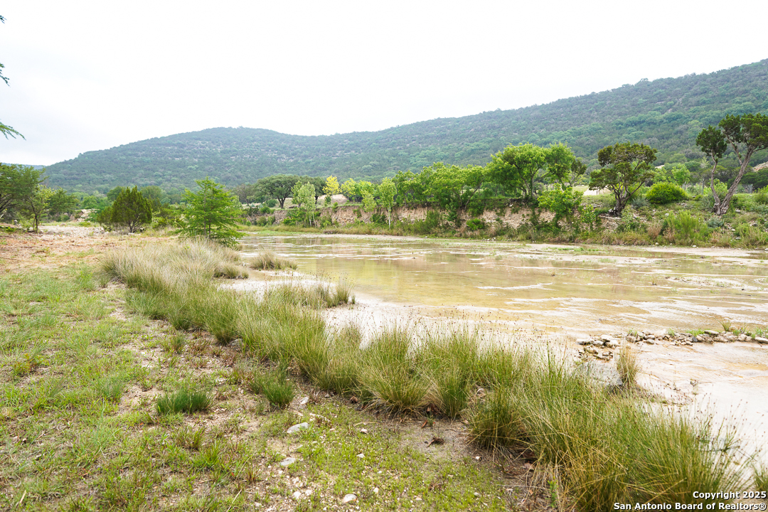 35298 Ranch To Market Road 187 Vanderpool, TX 78885 - Photo 10 of 29 a view of an ocean and a mountain
