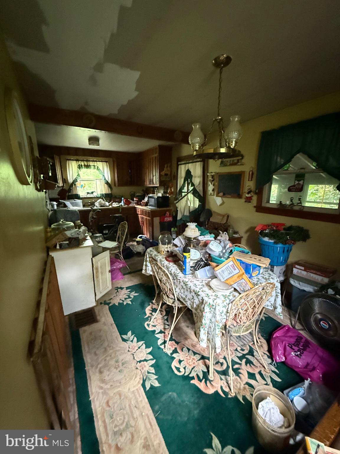 677 Monmouth Road Wrightstown, NJ 08562 - Photo 5 of 7 Cluttered kitchen in need of care.